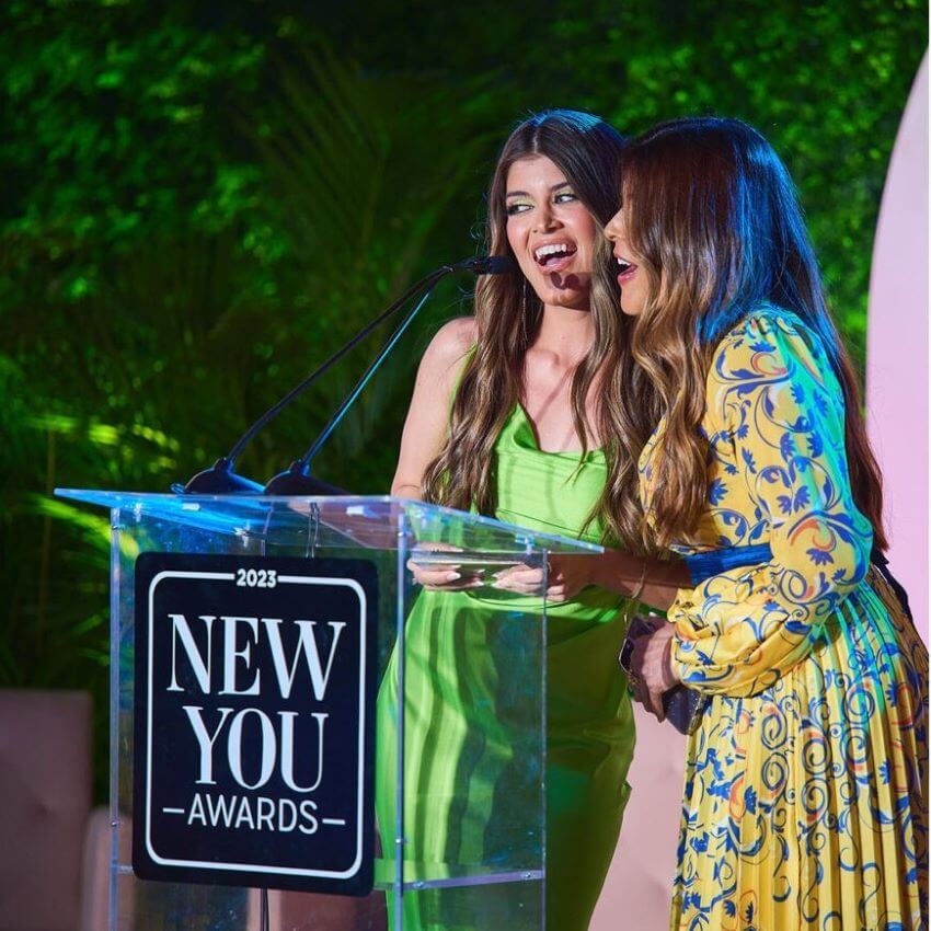 Image of two women in bright dresses for blog: H. HONEYCUP IN RUNNING: 2024 NEW YOU BEAUTY AWARDS