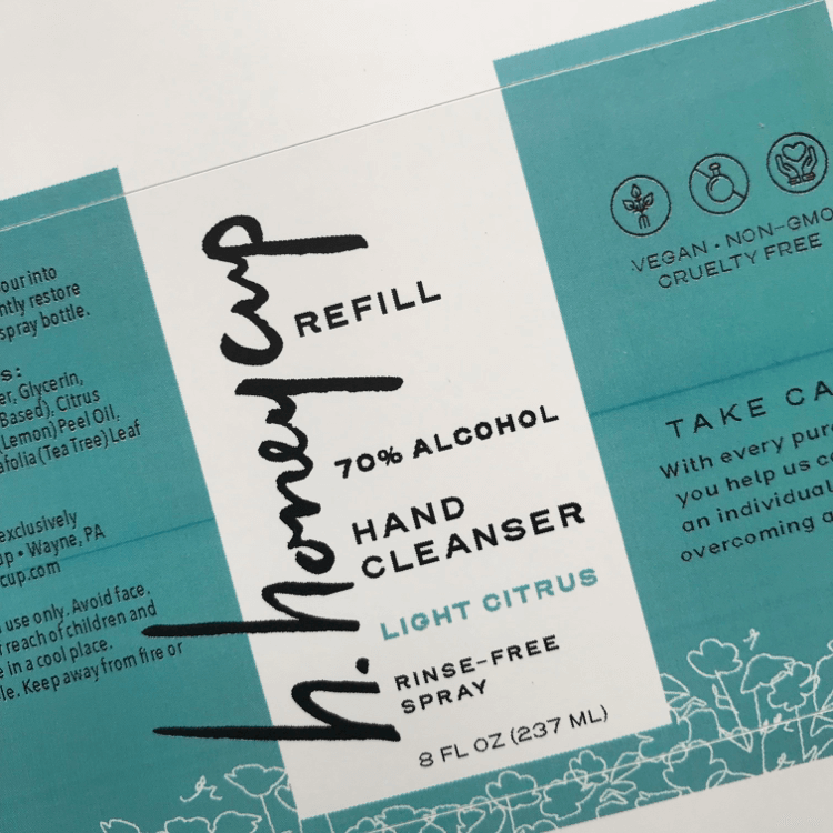 Flat label of hand sanitizer for blog and how sustainable skincare brands reduce plastic floating in the ocean