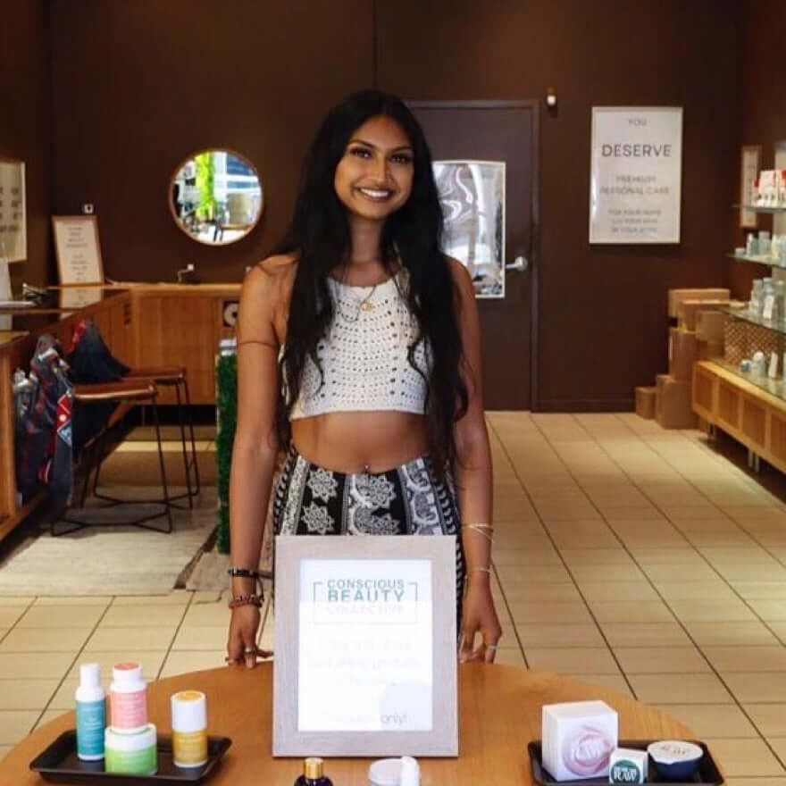Young woman working at popup for blog: GREEN BEAUTY COLLECTIVE: RETAIL SUCCESS STORY