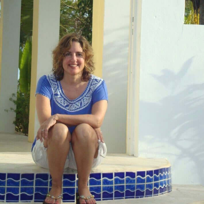 Image of determined young female with brown hair and sunglasses. For blog on how past struggles influence journey.
