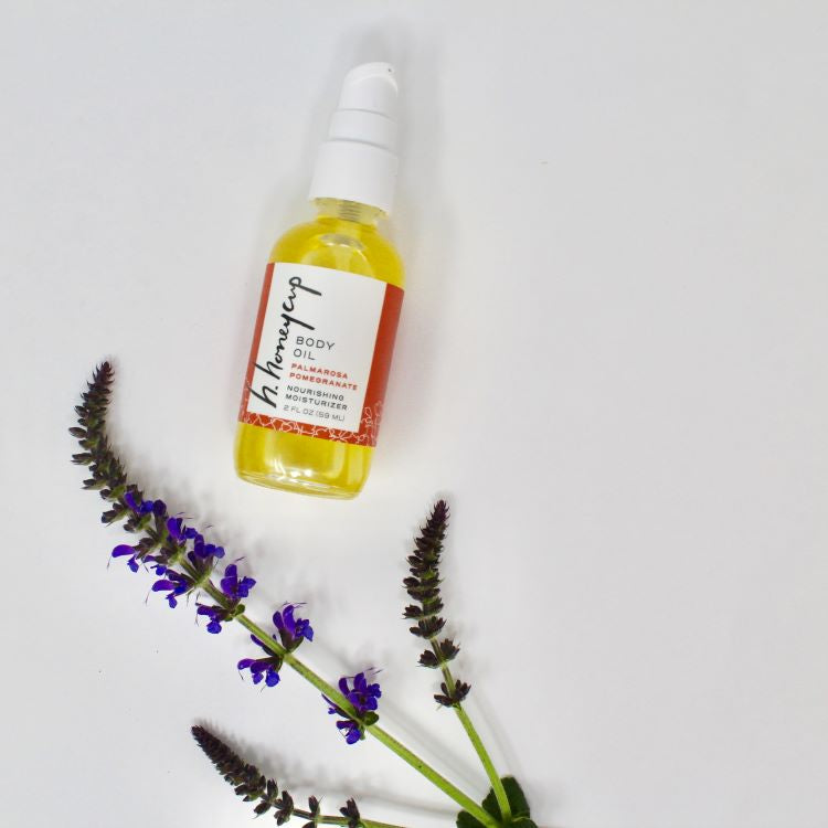 Photo of H. Honeycup natural body oil with lavender and palmarosa essential oils. For blog on how to have healthier skin using natural skincare.
