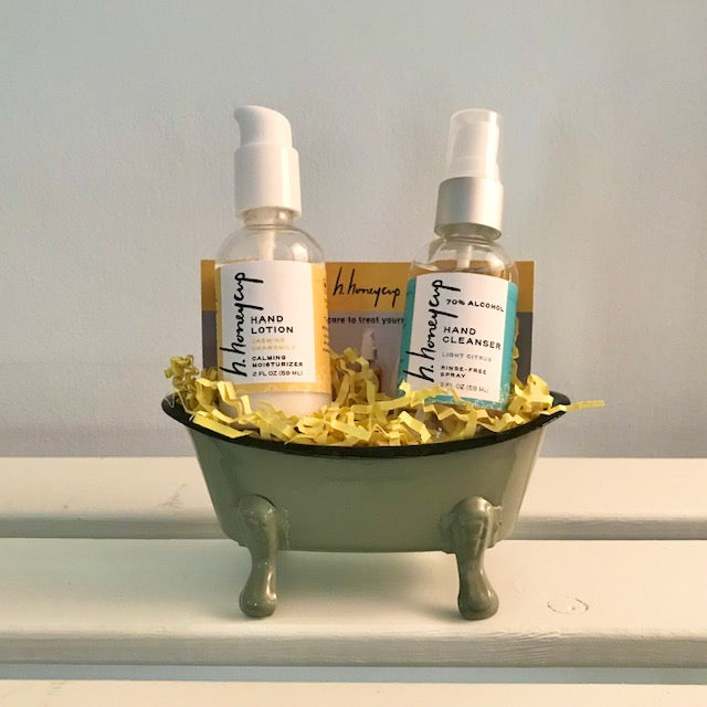 Hand lotion and hand cleanser in bath tub soap dish
