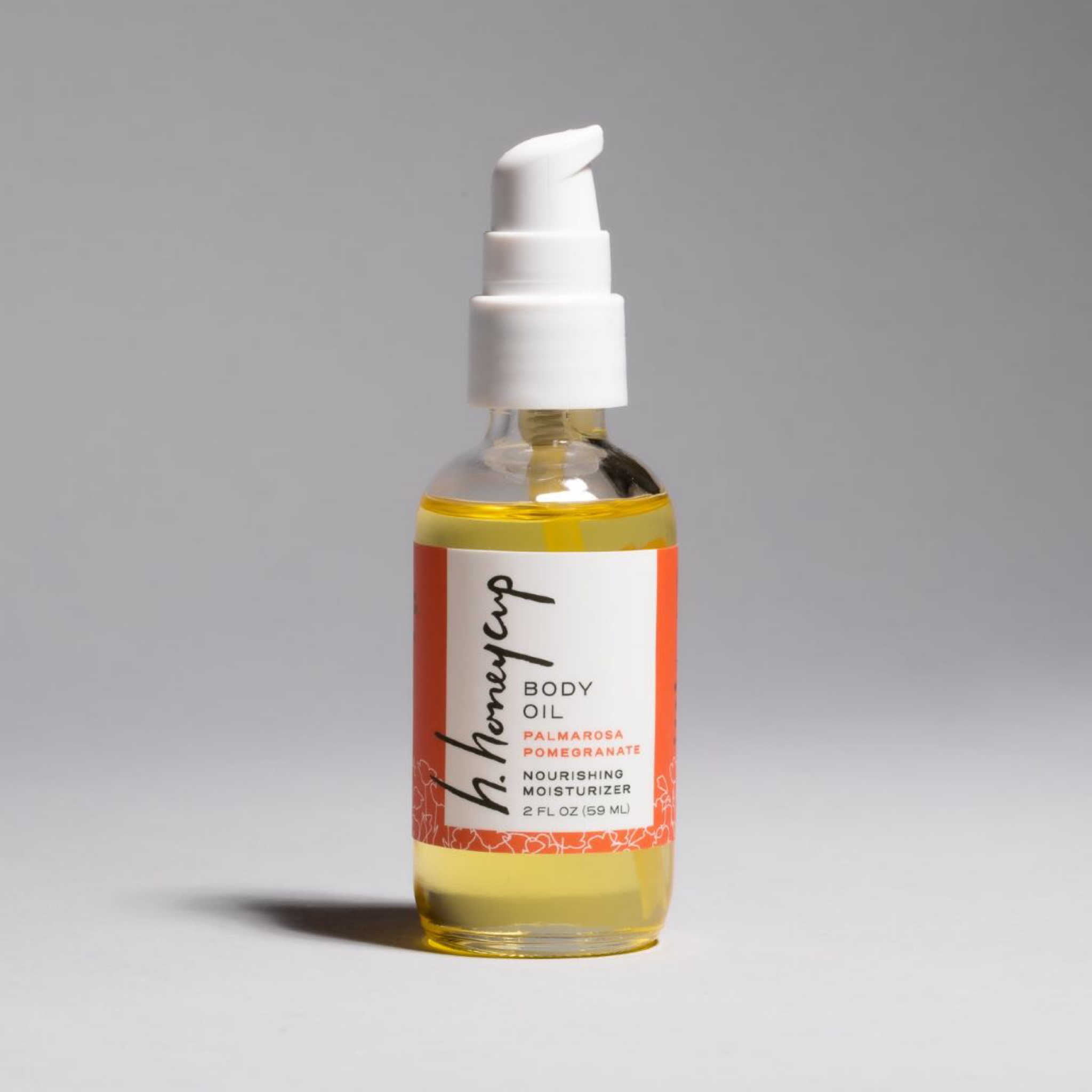 Palmarosa with lavender natural body oil. Product is a beautiful yellow color in 2 oz recyclable glass bottle with spray top