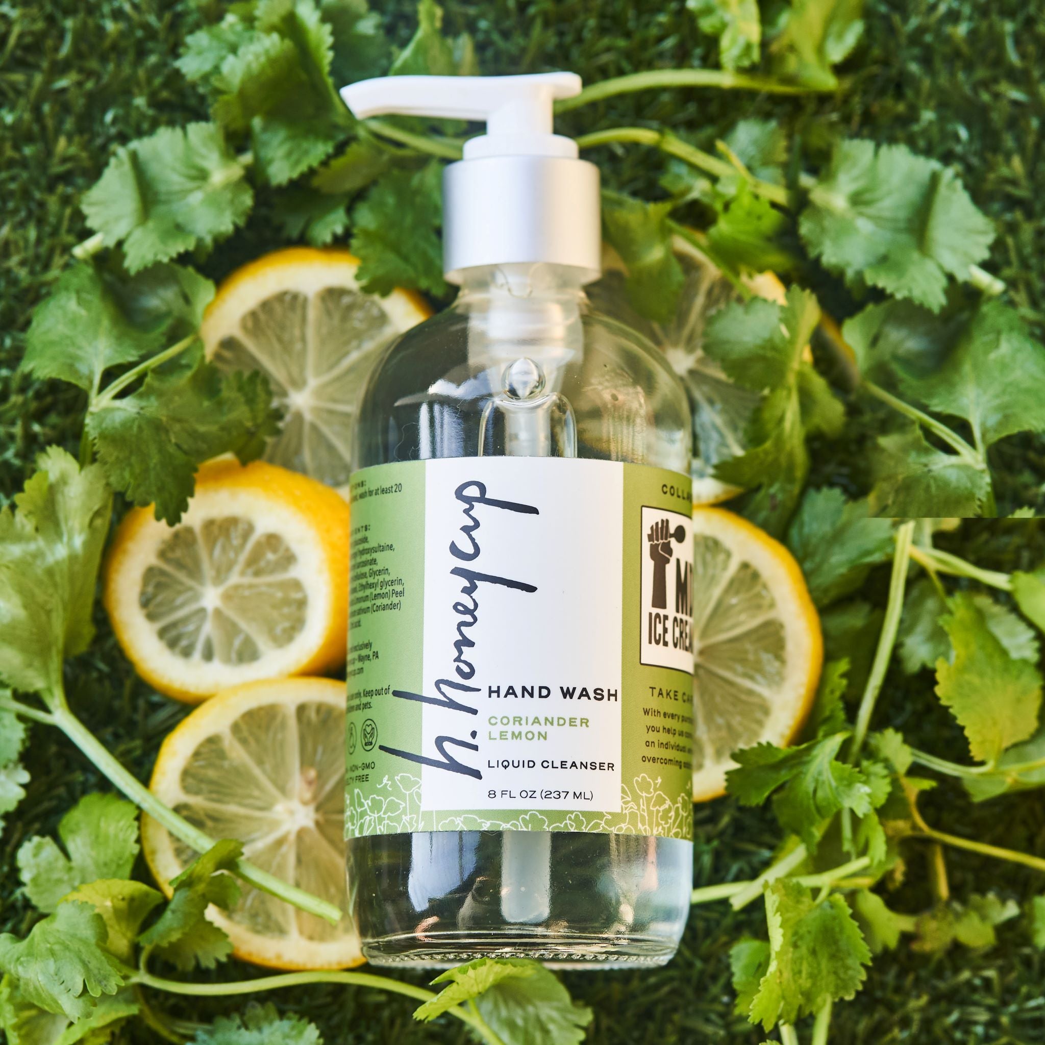 hand wash shown with real lemons and coriander